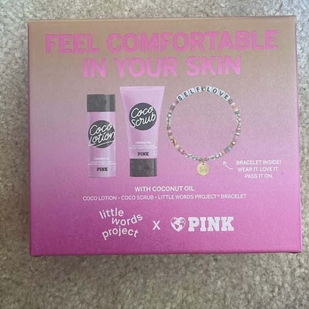 NIB pink feel comfortable in your skin lotion and body wash gift set